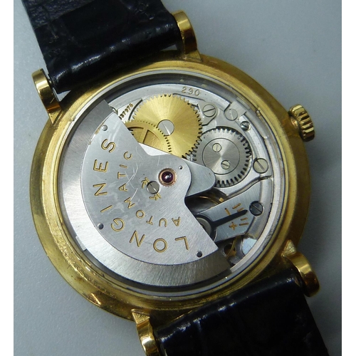 1034 - A Longines 18ct gold wristwatch, 35mm case including crown, with presentation inscription to case ba... 