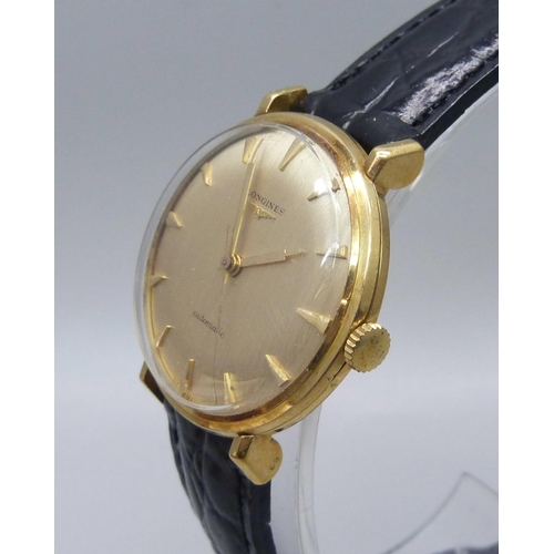 1034 - A Longines 18ct gold wristwatch, 35mm case including crown, with presentation inscription to case ba... 