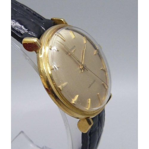 1034 - A Longines 18ct gold wristwatch, 35mm case including crown, with presentation inscription to case ba... 