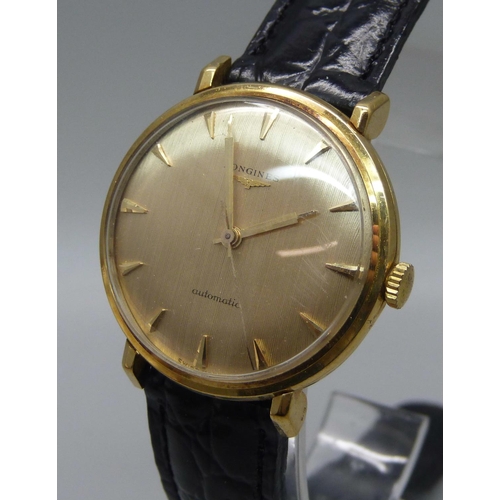 1034 - A Longines 18ct gold wristwatch, 35mm case including crown, with presentation inscription to case ba... 