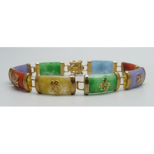 1036 - A silver gilt bracelet set with coloured gemstone panels, 18.5cm, 14g