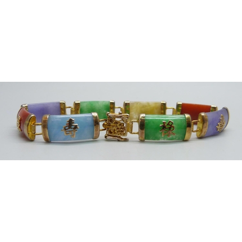 1036 - A silver gilt bracelet set with coloured gemstone panels, 18.5cm, 14g