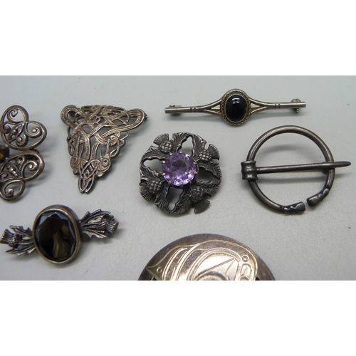 1038 - Two unmarked white metal brooches and eight marked as silver, stone set examples all stamped, 61g to... 