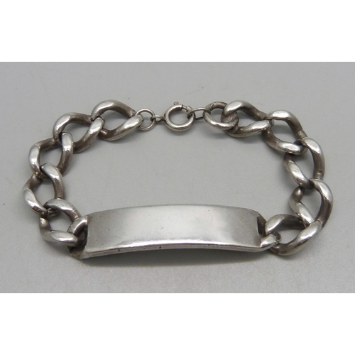 1042 - A silver ID bracelet, 18.5cm, 38g