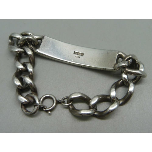 1042 - A silver ID bracelet, 18.5cm, 38g