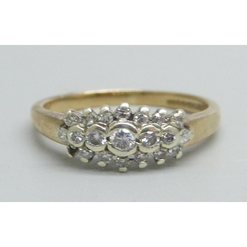 1060 - A 9ct gold ring set with diamonds, one missing, 2.3g, L