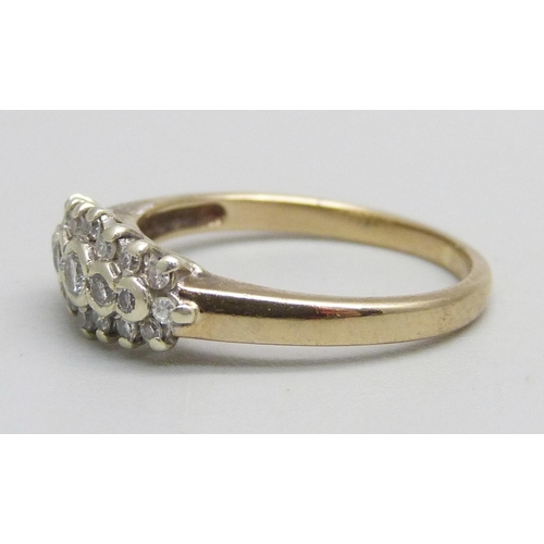 1060 - A 9ct gold ring set with diamonds, one missing, 2.3g, L