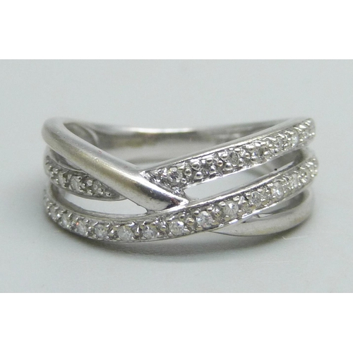 1070 - A 9ct white gold and diamond ring, stamped 012, 2.8g, L