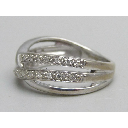 1070 - A 9ct white gold and diamond ring, stamped 012, 2.8g, L