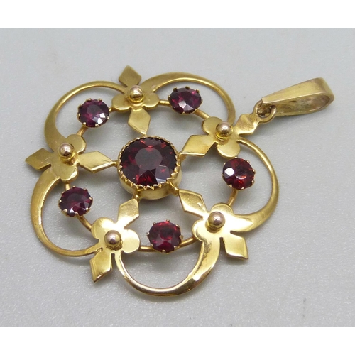 1071 - A 9ct gold pendant set with 6 garnets, 3.1g, 3.7cm drop