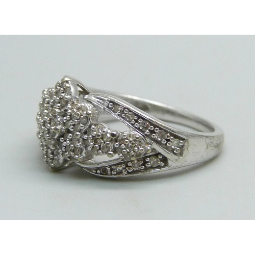 1074 - A 9ct white gold ring set with diamonds, 0.33ct, 3.6g, K