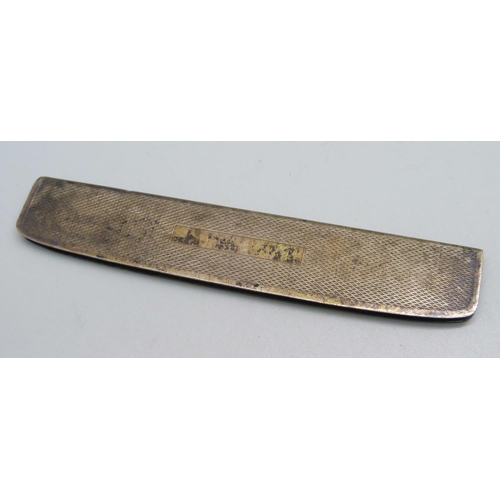 1078 - A silver vesta case with engraved initials, and a silver comb handle, 54g