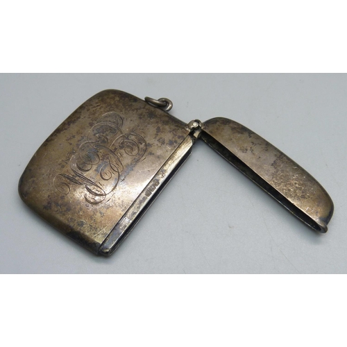 1078 - A silver vesta case with engraved initials, and a silver comb handle, 54g