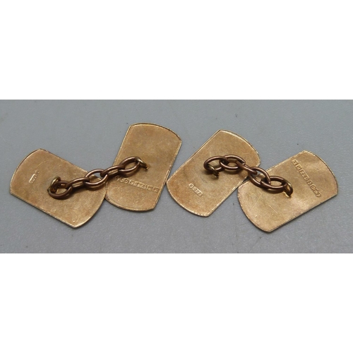 1083 - A pair of 9ct gold cufflinks with engine turned design, 3g