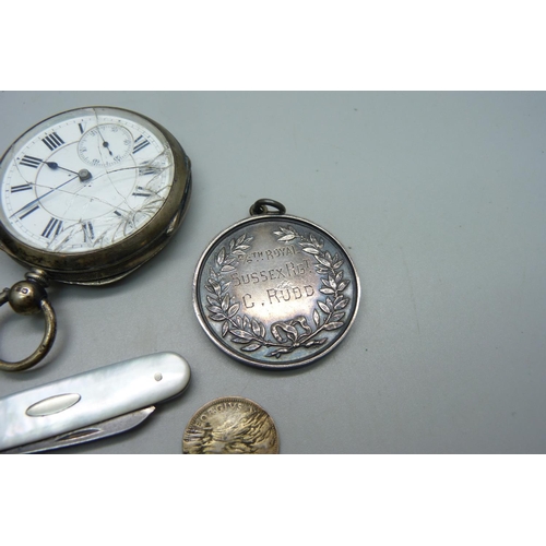 1084 - Two silver pocket watches, one Birmingham 1892 with Waltham movement, a large silver football fob, c... 