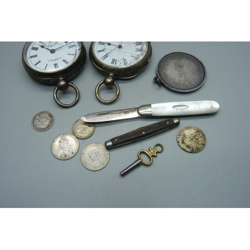 1084 - Two silver pocket watches, one Birmingham 1892 with Waltham movement, a large silver football fob, c... 