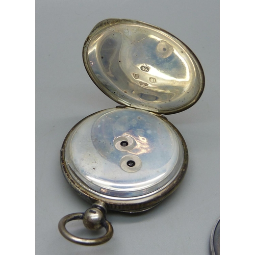 1084 - Two silver pocket watches, one Birmingham 1892 with Waltham movement, a large silver football fob, c... 