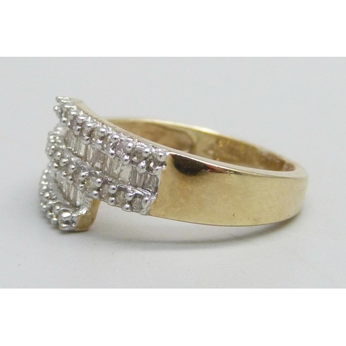 1093 - A 9ct gold ring set with diamonds, 0.50ct, 3.5g, N