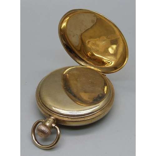 1096 - A 9ct gold cased half hunter pocket watch in a fitted case with long service inscription to case bac... 