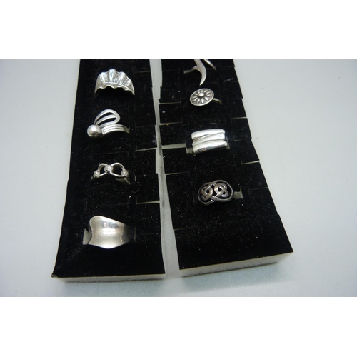 1103 - Ten silver rings, all with purity marks, 57g