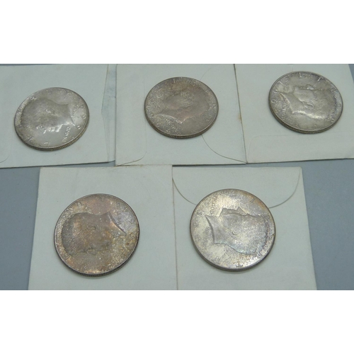 1107 - Five 1964 American silver half dollar coins