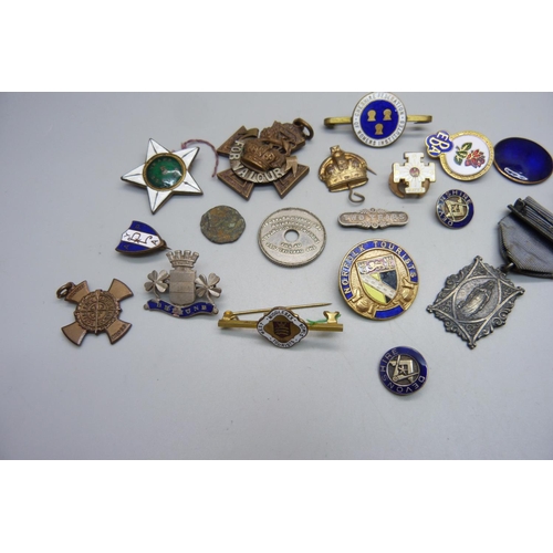 1118 - A collection of military pin badges and other badges including enamel