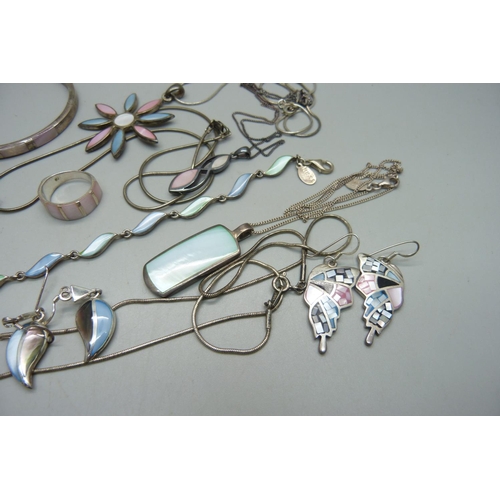 1129 - A collection of silver and mother of pearl jewellery, all stamped as silver, 112g