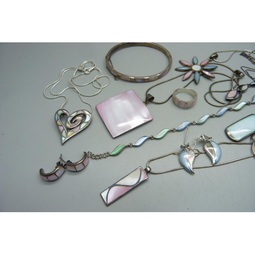 1129 - A collection of silver and mother of pearl jewellery, all stamped as silver, 112g