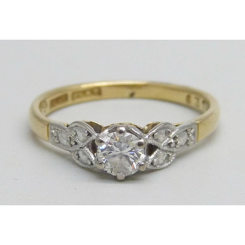 1141 - An 18ct gold and platinum diamond solitaire ring, 2.2g, K