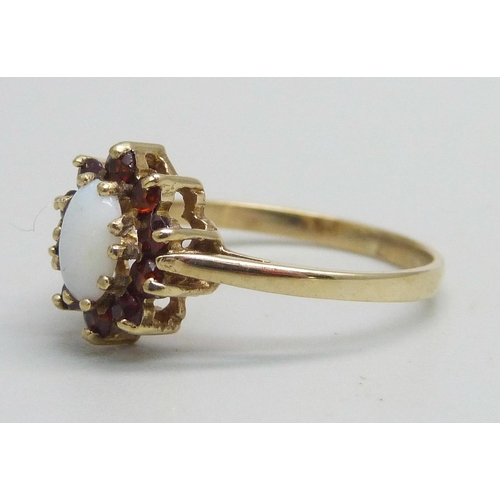 1142 - A 9ct gold, opal and garnet cluster ring, 1.5g, L