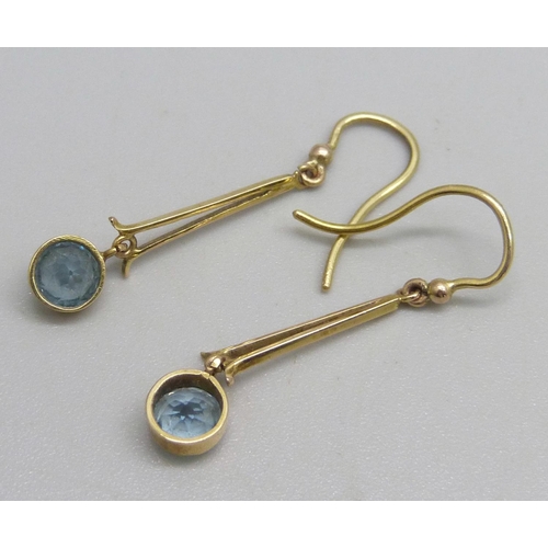 1145 - A pair of yellow metal drop earrings set with aquamarine stones, 1.4g, 3cm drop