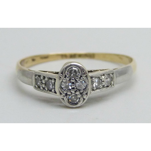 1146 - An 18ct gold and platinum ring set with diamonds, 1.8g, O