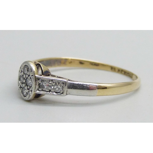 1146 - An 18ct gold and platinum ring set with diamonds, 1.8g, O