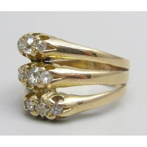 1151 - A yellow metal ring created from three individual diamond trilogy rings, stamped 18ct, 5.3g, M/N