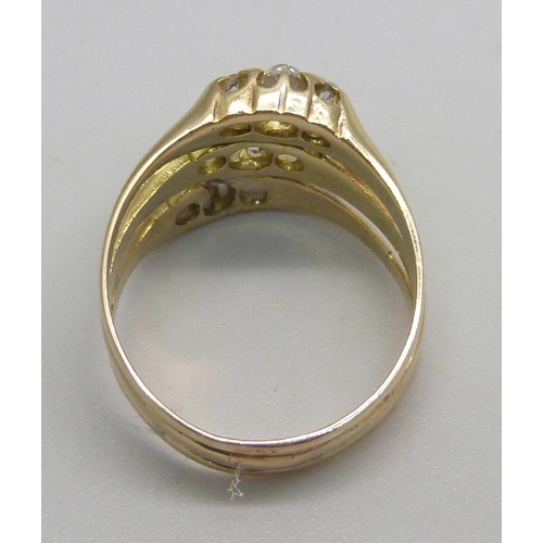 1151 - A yellow metal ring created from three individual diamond trilogy rings, stamped 18ct, 5.3g, M/N