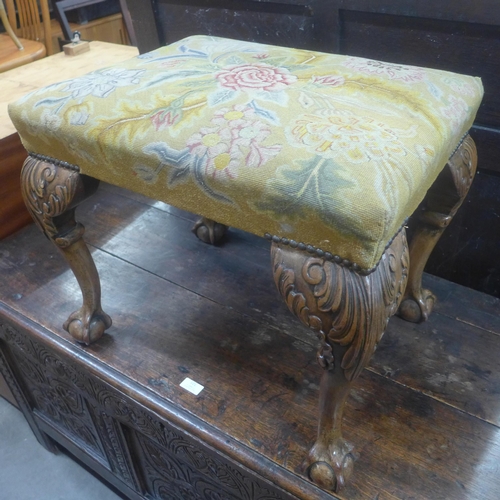 112C - A George I style carved walnut and embroidered stool