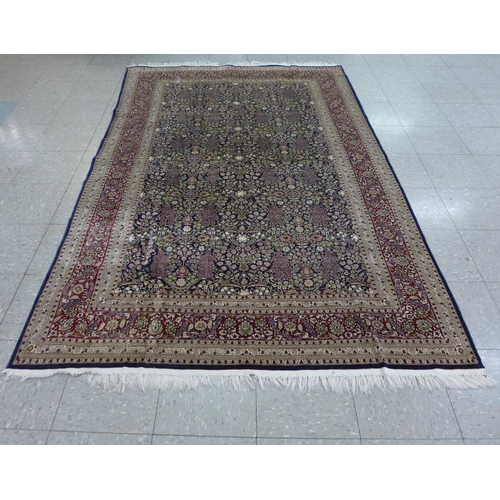 117 - An Eastern beige ground rug, 158 x 260cms