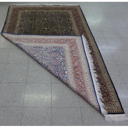 117 - An Eastern beige ground rug, 158 x 260cms