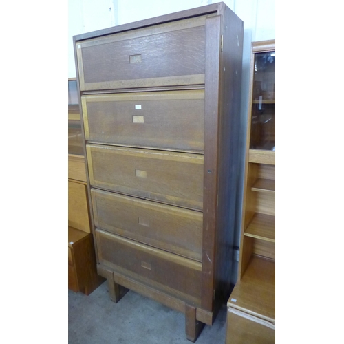 118 - A Staverton Government Issue light oak five door filing cabinet (locked and without a key)