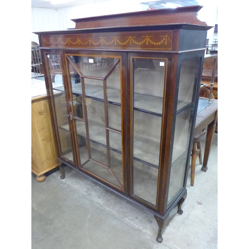 129 - An Edward VII inlaid mahogany display cabinet