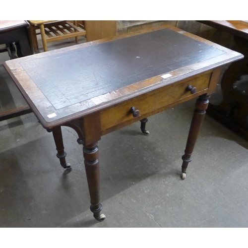 135 - A Victorian mahogany single drawer writing table