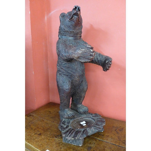 143 - A Black Forest style composite faux wood bear stick stand