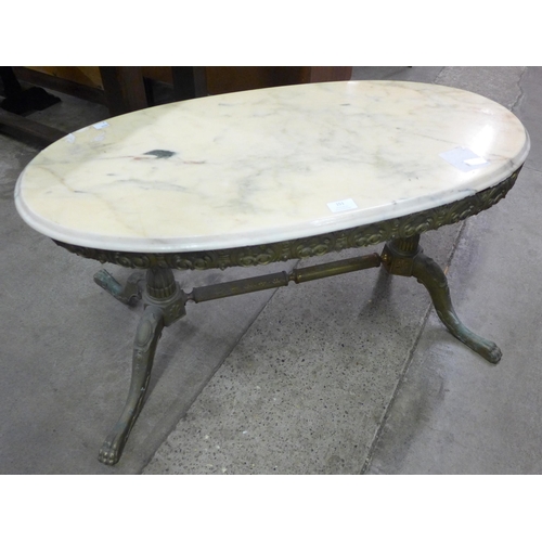 151 - A Frenxh brass and onyx oval coffee table