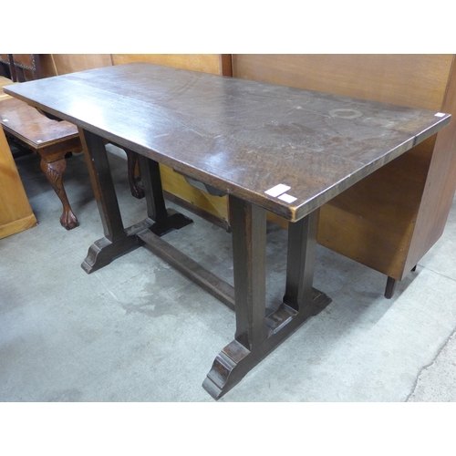 152 - An Arts and Crafts oak refectory table