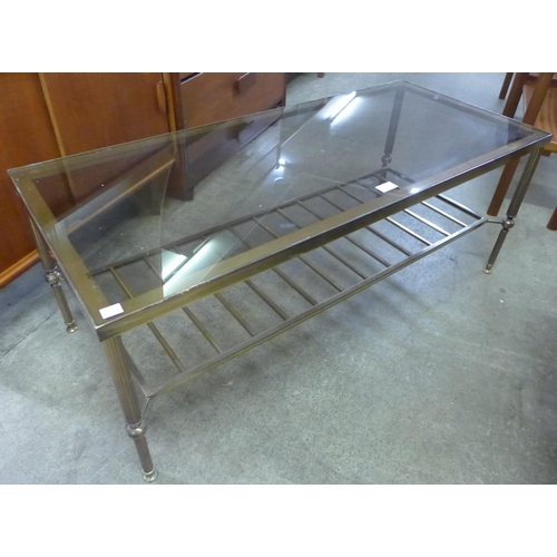 155 - An Italian brass and glass topped coffee table