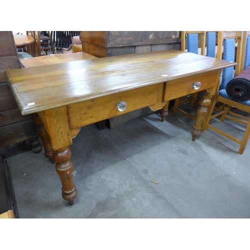 164 - A Victorian pine two drawer kitchen serving table