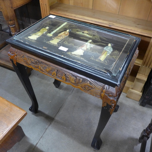 169 - A Chinese black chinoiserie occasional table