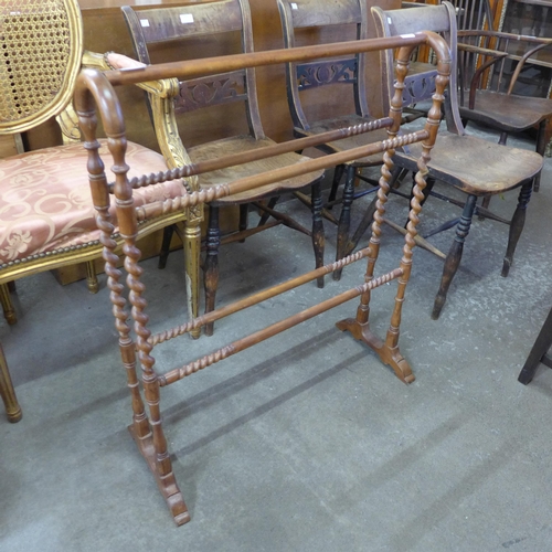 171 - A Victorian style mahogany towel rail