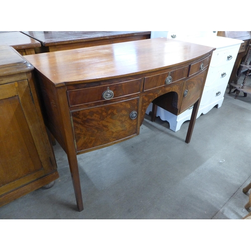 225 - A George III mahogany bow front sideboard