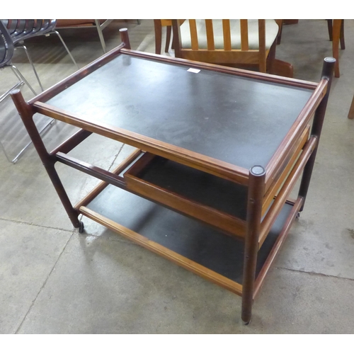 26 - A Danish C.F.C. rosewood and black lacquered cocktail trolley, designed by Johannes Anderson, CITES ... 